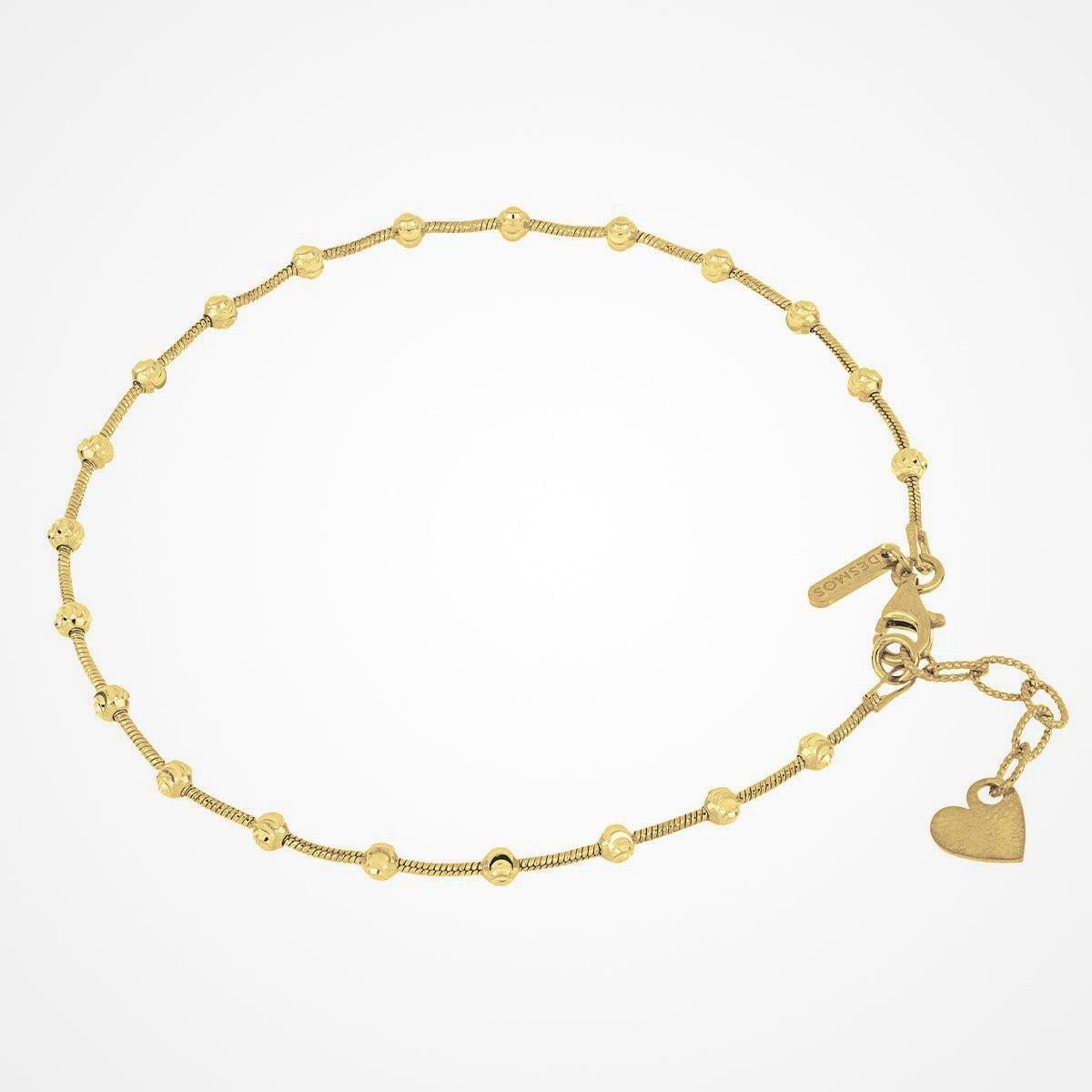 Cavigliera Desmos in argento dorato con sfere sfaccettate collegate