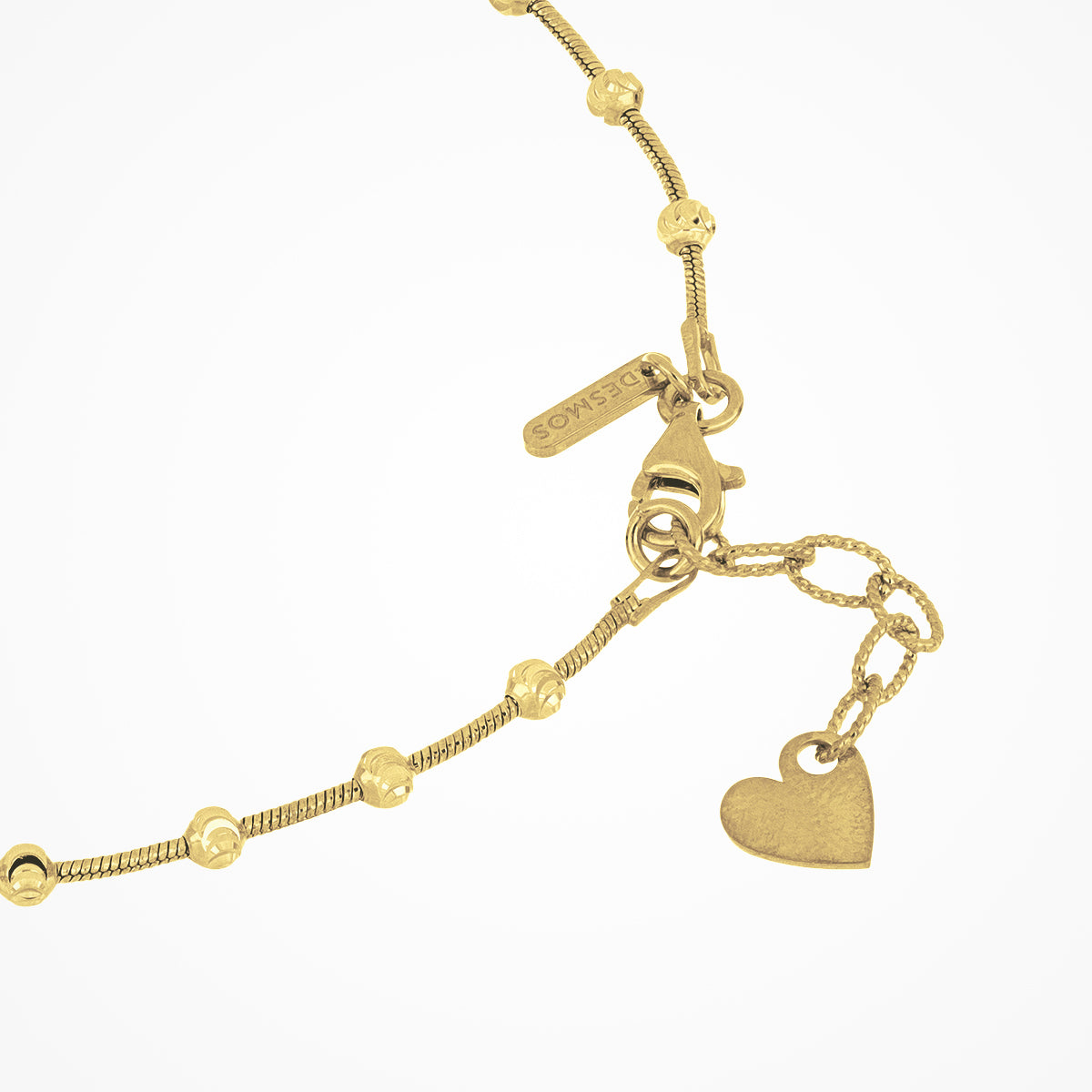 Cavigliera Desmos in argento dorato con sfere sfaccettate collegate