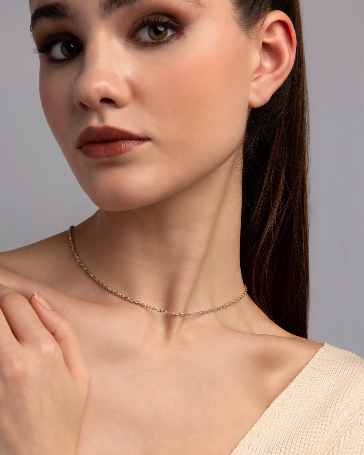 Collana Desmos in argento bicolore bianco e dorato a palline ovali piccole