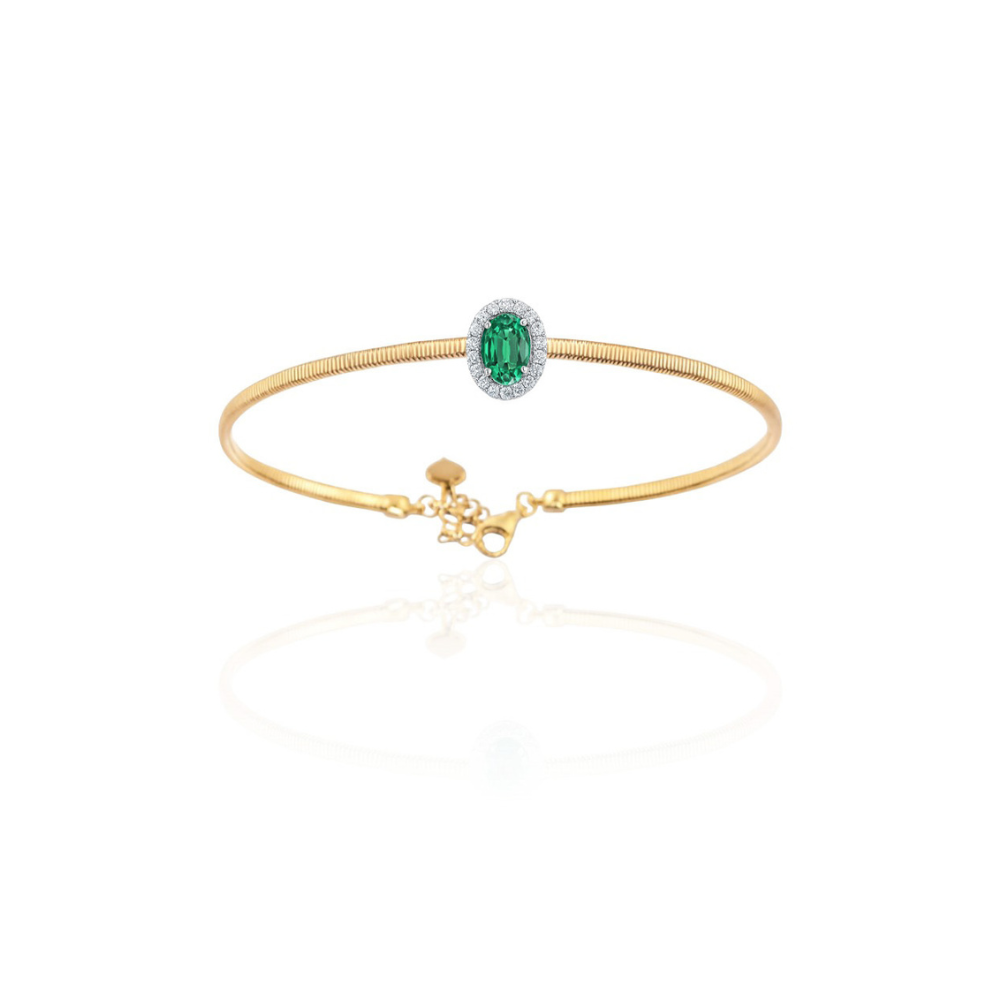 Bracciale Gianna Carità rigido in oro giallo e centrale in oro bianco con smeraldo e diamanti Collezione Aurea