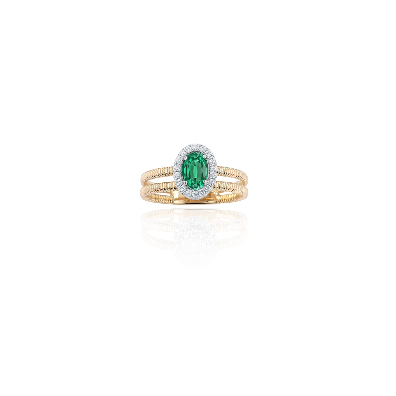 Anello Gianna Carità in oro giallo a doppia maglia tubolare e centrale in oro bianco con smeraldo e diamanti Collezione Aurea
