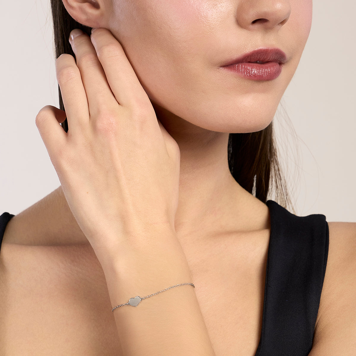 Bracciale Kidult Infinity in acciaio a catena con cuore centrale