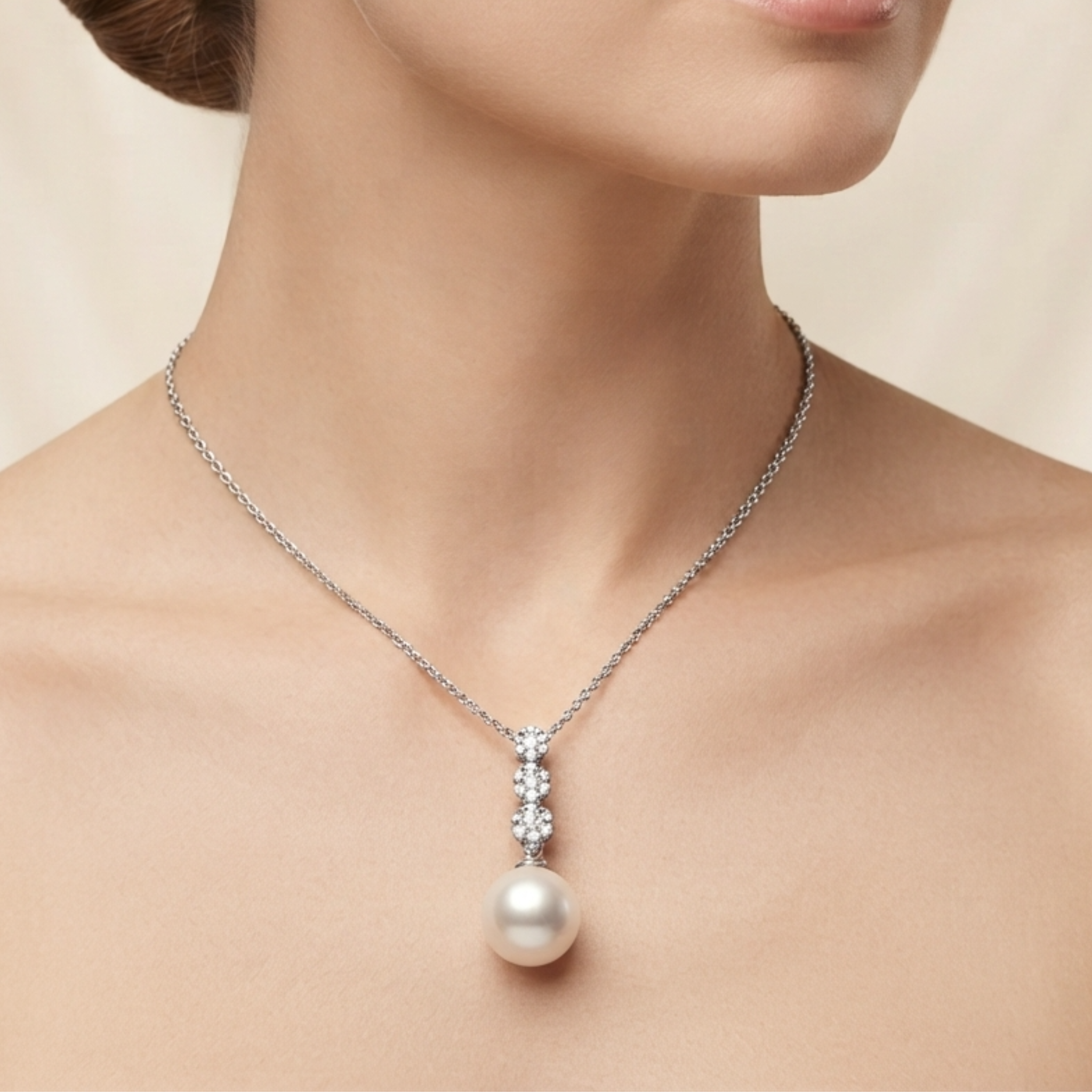 Collana Foè gioielli in oro bianco con pendente con tre elementi con diamanti a fiore e perla